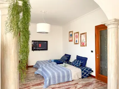 Letto o letti in una camera di Ornella's apartment - Relax near Venice