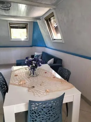 Area soggiorno di Sea Side Attic