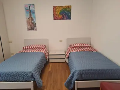 Letto o letti in una camera di Il posto Giusto