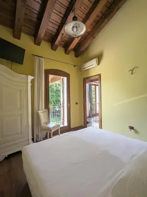 Letto o letti in una camera di Villa Iris
