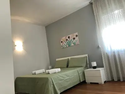 Letto o letti in una camera di Casa Denise