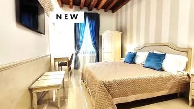 Letto o letti in una camera di Venice San Filippo Apartment