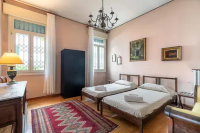 Letto o letti in una camera di Casa Flores - 2 camere Padova