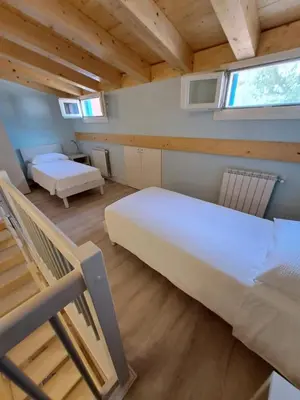 Letto o letti in una camera di Ca Jole
