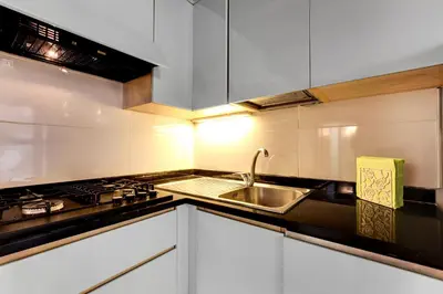 Cucina o angolo cottura di Smeraldo Apartment Loc-03081