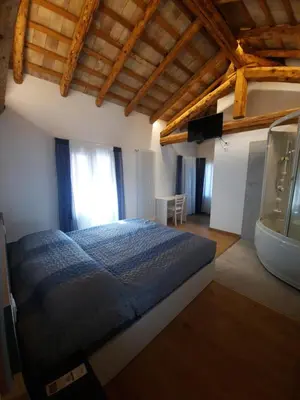 Letto o letti in una camera di VillaSveva