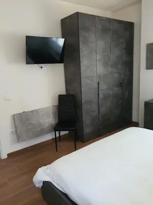 Letto o letti in una camera di La Casa de Papel - Berlino - Self Check in, Smart Tv, tutti i confort, nuova costruzione