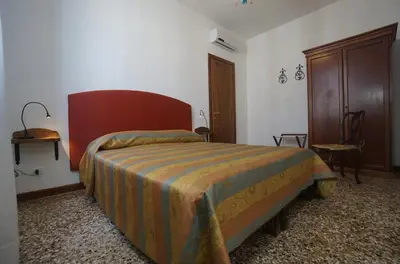 Letto o letti in una camera di Campo San Lorenzo