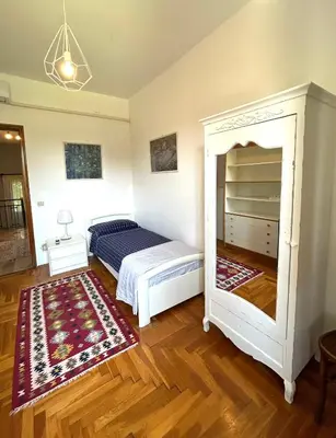 Letto o letti in una camera di Casa Bellona