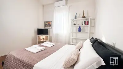 Letto o letti in una camera di HT - Loft di design alla Cappella degli Scrovegni