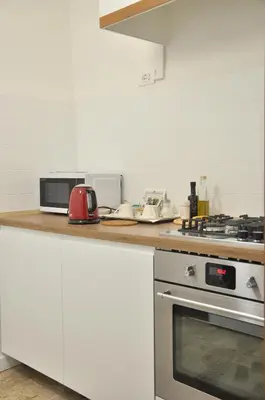 Cucina o angolo cottura di Corte Formenta Holiday Home - 5 minuti da Biennale