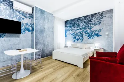 Letto o letti in una camera di La Bella Vita - In Blu
