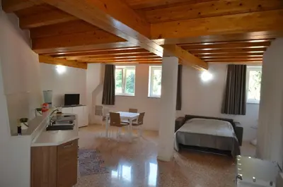 Letto o letti in una camera di Palazzo Maggiore Suite A