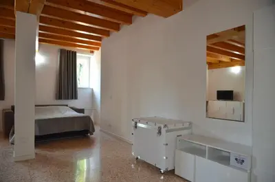 Letto o letti in una camera di Palazzo Maggiore Suite A