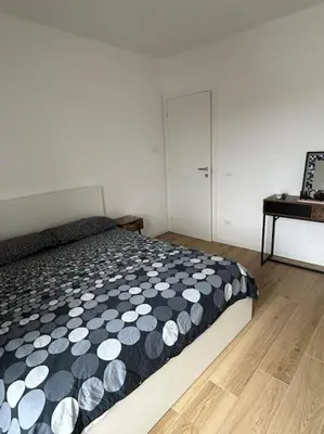 Letto o letti in una camera di Villetta bifamiliare Jesolo