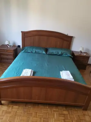 Letto o letti in una camera di CASA CATERINA