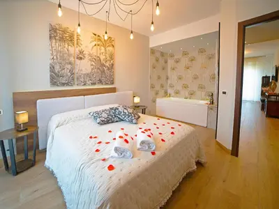 Letto o letti in una camera di 12 min da Venezia - Enide Luxury House