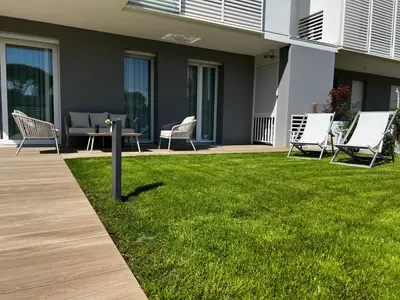 Giardino di Piscina Fronte Mare & Giardino Privato - Jl Blue Apartments