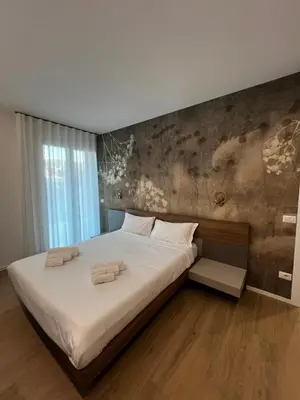 Letto o letti in una camera di Piscina Fronte Mare & Giardino Privato - Jl Blue Apartments