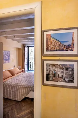 Letto o letti in una camera di Suite Palladio Centro Vicenza A 2 Passi da Piazza dei Signori Check-in Veloce