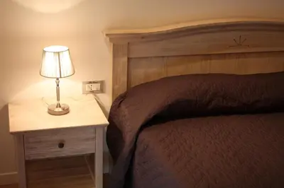 Letto o letti in una camera di Elis' Rooms