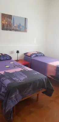 Letto o letti in una camera di La maison de Daniela