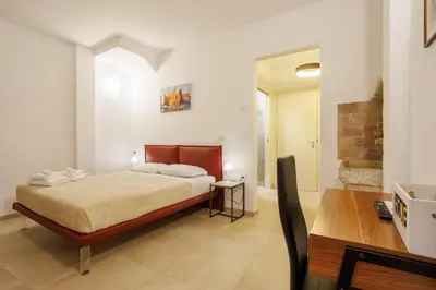 Letto o letti in una camera di Casa Nostrana