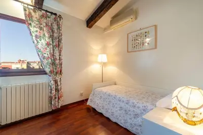 Letto o letti in una camera di Palazzo Gradenigo by Wonderful Italy