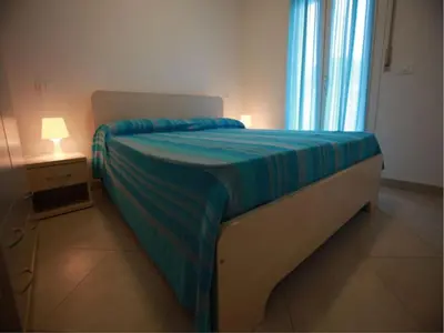 Letto o letti in una camera di Beautiful flat close to the beach