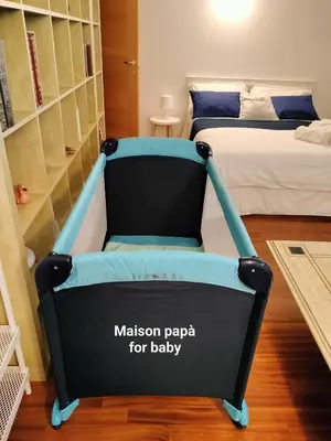 Letto o letti in una camera di Maison Papà, una casa per sentirsi a casa.
