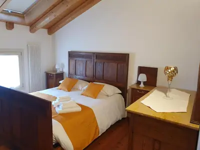 Letto o letti in una camera di CASA TOFFOLI SOLIGO - locazioni turistiche