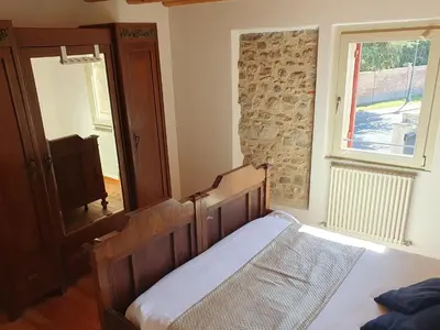 Letto o letti in una camera di CASA TOFFOLI SOLIGO - locazioni turistiche