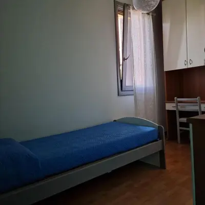 Letto o letti in una camera di Il Giardino di Cristina