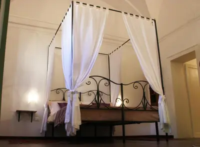 Letto o letti in una camera di InChiostro Rooms&Breakfast