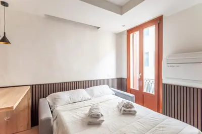Letto o letti in una camera di GuestHost - Padova - Piazza dei Signori Central Flats