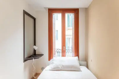 Letto o letti in una camera di GuestHost - Padova - Piazza dei Signori Central Flats