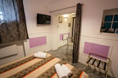 Letto o letti in una camera di San Polo Studio