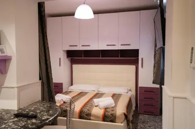 Letto o letti in una camera di San Polo Studio