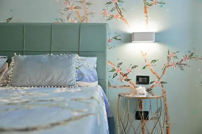 Letto o letti in una camera di Flora Cottage Guesthouse Burano