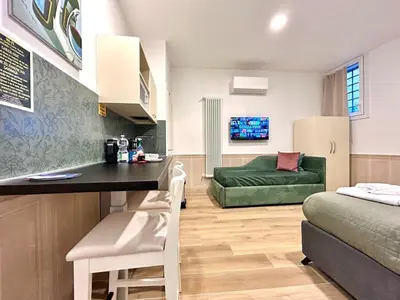Area soggiorno di Suite Della Corte Apartment