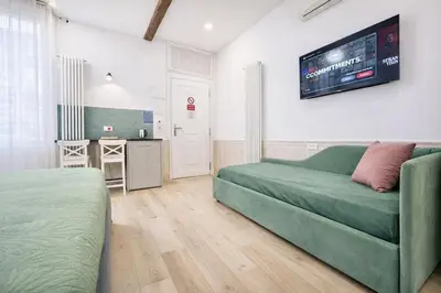 TV o dispositivi per l'intrattenimento presso Suite Della Corte Apartment