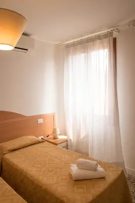 Letto o letti in una camera di Sweet Balcony - Campo S.Giacomo dell'Orio