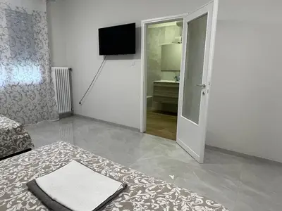 TV o dispositivi per l'intrattenimento presso Casa Roma rooms&apartments
