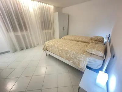 Letto o letti in una camera di Amikales Rooms