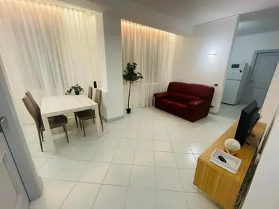 Area soggiorno di Amikales Rooms