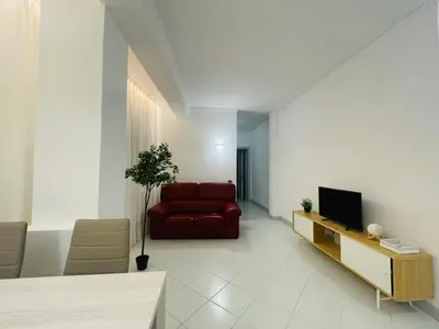 TV o dispositivi per l'intrattenimento presso Amikales Rooms