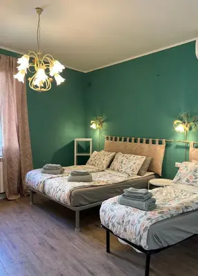 Letto o letti in una camera di Ca' Rioba - Patio Privato e Vista Canale a Cannaregio