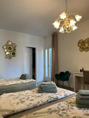 Letto o letti in una camera di Ca' Rioba - Patio Privato e Vista Canale a Cannaregio