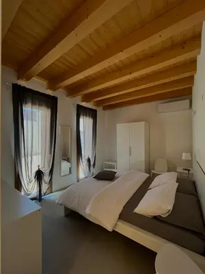 Letto o letti in una camera di Residence Duomo