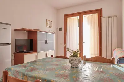 Cucina o angolo cottura di Poolside escape in Rosolina-Beahost
